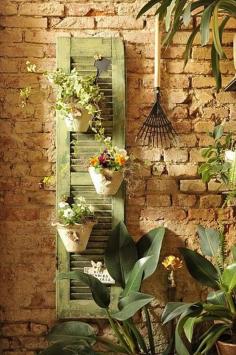 Vertical Garden Ornament Planter idea - 25 DIY Low Budget Garden Ideas | DIY and Crafts