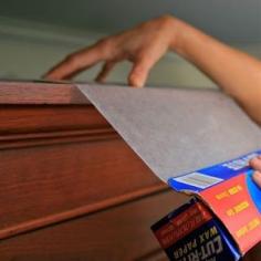 Place a layer of waxed paper on top of kitchen cupboards to prevent grease and dust from settling. Switch out every few months to keep them clean.