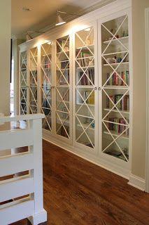 Built in bookcases with glass doors