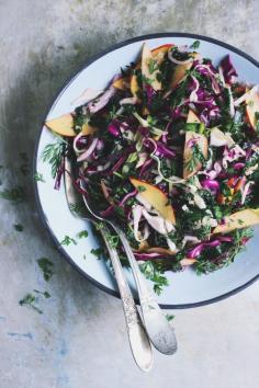 Kale salad with cabbage, nectarines, fresh herbs and lime dressing