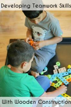 Developing teamwork skills with a wooden construction activity - great for siblings of different ages