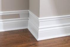 Make your baseboard more dramatic...add small pieces of trim to the top of existing baseboard, add a few inches and add another piece of molding. Paint the wall and trim white. This also works for crown molding too!