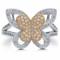 This lovely 2-tone butterfly fashion ring is made of fine sterling silver, plated with rhodium, and stamped with a 925 quality mark. The center butterfly is plated with yellow gold. Glaring with 138 pcs micro pave set, round cut, clear cubic zirconia stones measure 1mm each and weigh 0.69 carat in total. This ring measures 2mm - 7mm in width and weighs 4.3 gram. Complete the look with this sterling silver 925 2-tone butterfly cubic zirconia cz fashion ring - size 9 jewelry. Berricle.com jewelry style # r503-9.