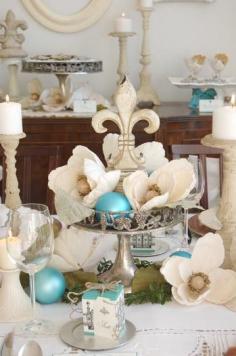 This table works for anyone from Louisiana.  Beautiful magnolia blooms and Fleur-de-lis (Go Saints!). Love the silver, creams & whites with a pop of blue!