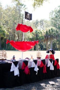 How cool is this to set up a fake pirate at the table. Love it!  Pirate Party #pirate #party