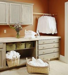 Lively laundry rooms - pole. Had a pole installed after seeing this picture. Keeping pin because there are many ideas and photos on the site.