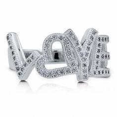 This lovely love script fashion ring is made of fine sterling silver, plated with rhodium, and stamped with a 925 quality mark. Embellished with 63 pcs micro pave set, round cut, clear cubic zirconia stones measure 1mm each and weigh 0.315 carat in total. This ring measures 3mm 5.3mm in width and weighs 3.6 gram. This is the gift that beyond all words. Complete the look with this sterling silver 925 love script cubic zirconia cz fashion ring - size 8 jewelry. Berricle.com jewelry style # r520-8.