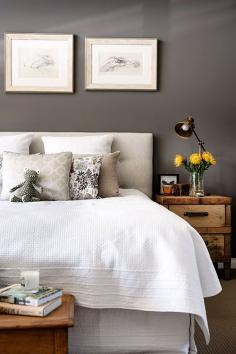 Love the darker gray walls with soft gray & white bedding. Beautiful wood accents. too.