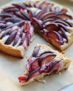 A stunning fruit tart filled with a rich almond cream and juicy plum filling.