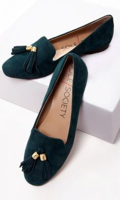 Suede loafer with tassel detail.