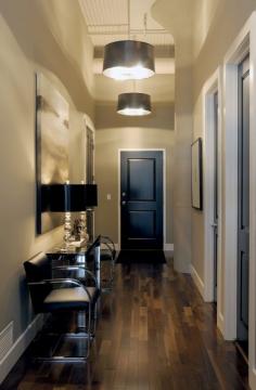 Hallway - really like the look of the wood floors, white door casings, and black doors! Very elegant!!