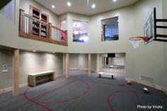 A carpeted basketball court is definitely something we all need! #basketball #remodeledbasement