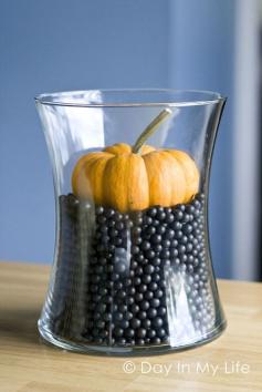 I would do a WHITE pumpkin Halloween centerpiece - black beans & mini pumpkin