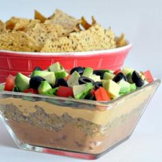 
                        
                            Vegan Seven Layer Dip with Noocho Cheese
                        
                    