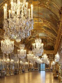 Hall of Mirrors, Chateau Versailles. Love it! At night, and no people interfering with the reflections. :)