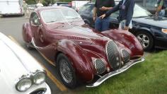 This Talbo is an updated take on the gorgeous teardrop Talbot Lago coupes, which today auction off for an untouchable 4 or 5 million bucks each. These replicas go for about $170,000 new, and remain faithful to the fantastic looks of the originals. I thought this was the real thing until I got a closer look at it