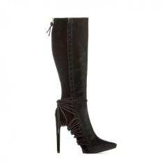 
                        
                            Pointed-toe boot  with mixed-material styling and an abundance of strappy cords.
                        
                    
