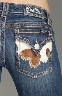 cowhide pocket trim Miss Me Jeans. Every where is sold out of these and I want a pair so damn bad!