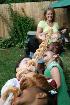 Doughnut on a string party game! Too fun! @Toby Mayer Mayer Matson I thought of you for the next time the Dirks' come over!!!