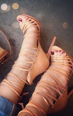 
                    
                        Strappy stilettos.
                    
                