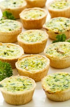 You can cook these mini quiches in advance and keep them in the refrigerator until you need them, heating them in the oven to keep the pastry crisp. You could also microwave them but then they might get a bit soggy. This delicious recipe features cream, cheddar cheese, spinach and more, for a really good flavor, and these mini quiches make excellent finger food.