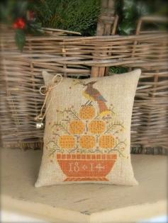 
                    
                        Cedar Waxwing is the title of this cross stitch pattern from Notforgotten Farm. The designer writes that Cedar Waxwings are beautiful birds that love to eat oranges.
                    
                