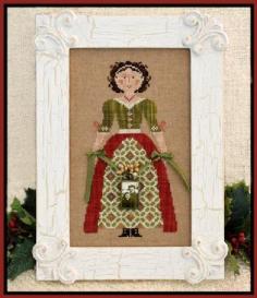 
                    
                        My Lady At Christmas is the title of this cross stitch pattern from Little House Needleworks that is stitched with Classic Colorworks (Mossy, Caterpillar and Licrorice Red) and DMC threads. The charm shown in the photo is not included and the designer writes to choose something of your own (charm or photo) to personalize your completed project.
                    
                