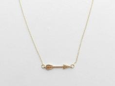
                    
                        Arrow necklace on 14k gold filled chain.
                    
                