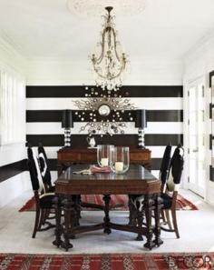 
                    
                        A Divine Dining Room. Black and white horizontal stripes. The Dining Room of Clora Kelly and Helge Skibeli’s Shelter Island, New York, home.  Photographed by Tim Street-Porter.
                    
                