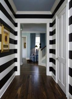 
                    
                        Make an entrance. Black and white horizontally striped walls.
                    
                