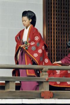 
                    
                        Princess Noriko of Takamado, in ancient Japanese formal court attire, attends a Shinto rite on Oct. 2, three days before her marriage.
                    
                