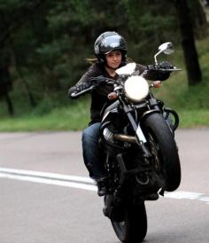 
                    
                        I just love the look on her face.  "Yeh, no big deal. Lofting the wheel on a Moto Guzzi; just another day"
                    
                
