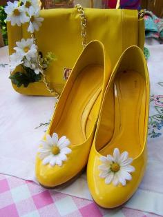 
                    
                        I had some shoes just like this when I was a little girl! But I think the flower also had some black on it and of course not high healed
                    
                