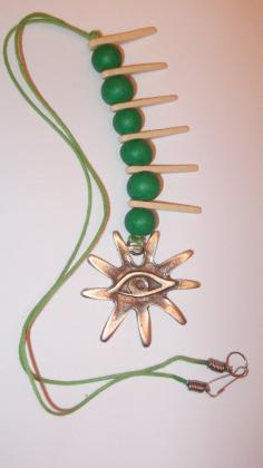 Green Necklace with metallic sun