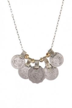 
                    
                        Simple, vintage coin necklace by Ax+Apple.
                    
                