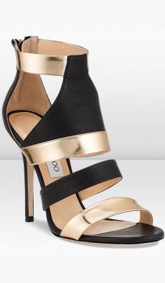 Jimmy Choo Besso Black Leather and Gold Mirror Leather Sandals ($895)