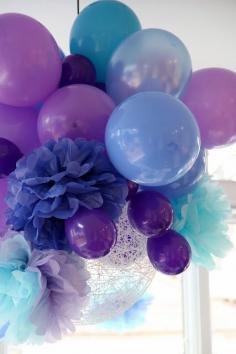 
                    
                        balloons and tissue paper flowers
                    
                