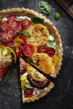 An elegant tomato tart for your summertime table.  (comments say to use ready-made pie crust, not one from this recipe)