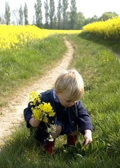 This was me as a kid.  I loved picking flowers.  There are many stories of how meticulously I picked them and how I would stop at the side of the road to collect my bouquets :)