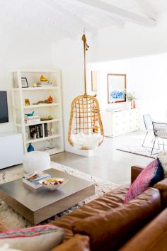 Hanging chair in open living room