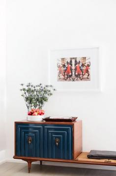 
                    
                        Vignette styled with flowers and fruit
                    
                