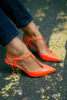 
                    
                        T-strap tangerine kitten heels
                    
                