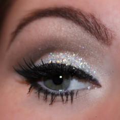 
                    
                        Glamorous cut crease with silver glittery lids are featured on this night out ready makeup. Follow the detailed how-to and recreate this look for your next party.
                    
                