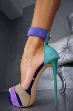 super high heels!! I'd plummet to my death while wearing these...but still...the color combo is cute though