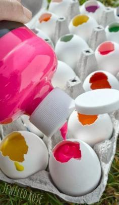 Fill eggs with paint and toss them at canvas. Fun craft to do with kids!
