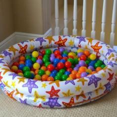 
                    
                        They have something similar to this in the nursery at the village church except the balls are in a crib. My daughter loved it.
                    
                