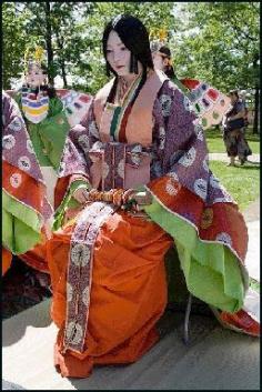 "Heian Period Clothes (794-1185).  Still a matriarchal family system; There were female feudal lord, and economically independent women artists and writers that left a distinct feminine impint on the culture of that time. Courtiers wore junihitoe, literally, 12 layers of silken robes, but often included as many as 20, weighing several kgs."