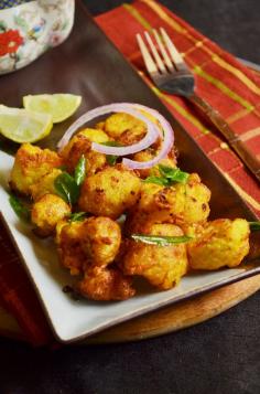 
                    
                        Gobi 65 recipe :Crispy and spicy fried cauliflower florets topped with onion and lemon juice.  Recipe @ cookclickndevour.... #cookclickndevour #indianfood #streetfood #cauliflower
                    
                