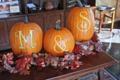 The newlyweds initials carved in pumpkins - such a cute decor for the reception venue's entryway #wedding #fall #fallwedding #diywedding #rustic