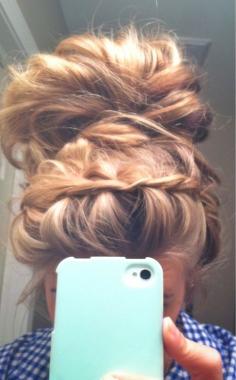 messy braid bun! Makes me wish i had long hair agian! :/